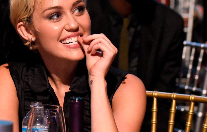 Miley cyrus kisses new guy