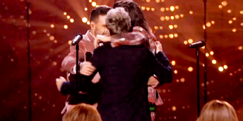 one direction history x factor group hug