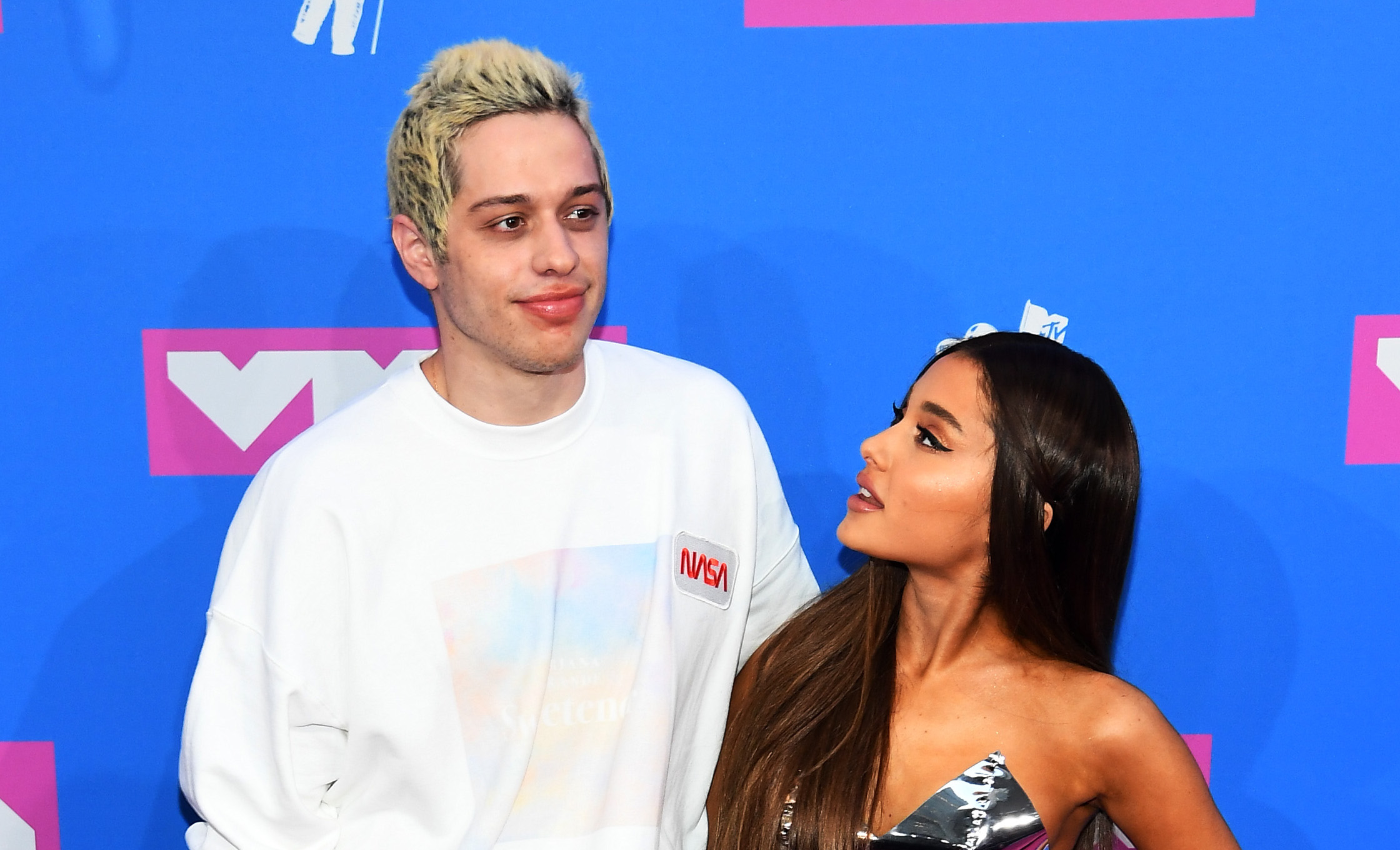 Ariana Grande flashes her unique engagement ring as she returns to stage  after wedding - Mirror Online
