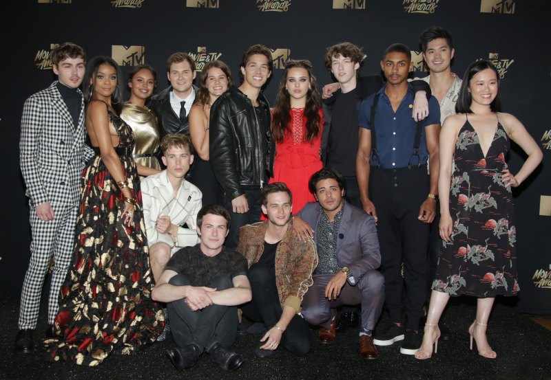The ‘13 Reasons Why’ Cast May Play High Schoolers On Screen, But They're Much Older in Real Life