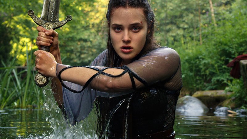 Katherine Langford Shows Off Her ‘Warrior’ Side In Trailer For Upcoming Netflix Series ‘Cursed’