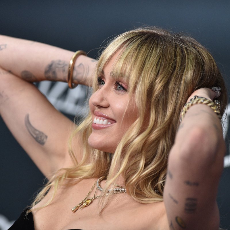 Miley Cyrus' Tattoos: Ink Designs, Meanings, Photos