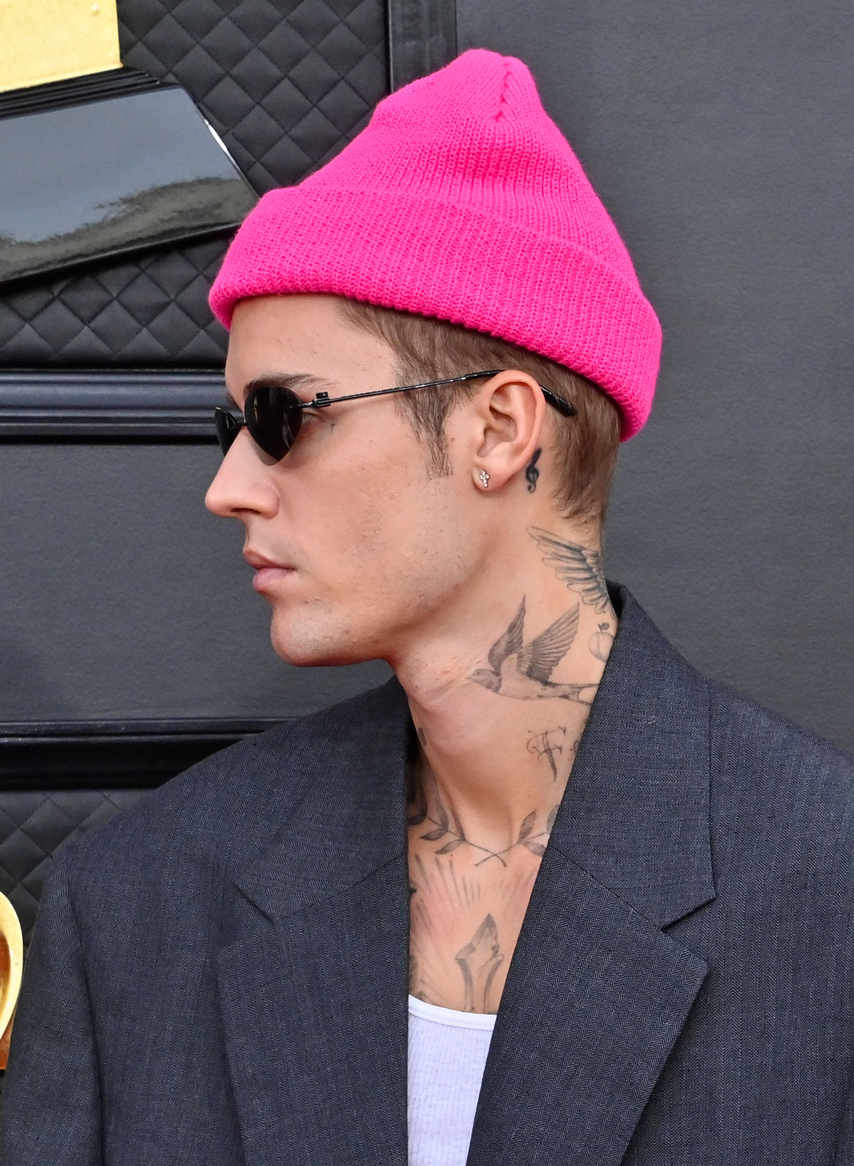 Justin Biebers Tattoo Wings Tattoo Neck Tatoo  YouTube