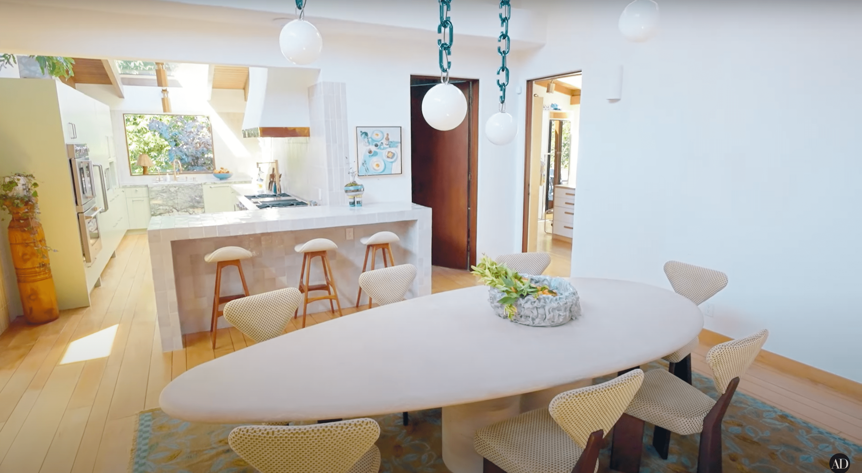 Inside Emma Chamberlain's marbled midcentury modern home