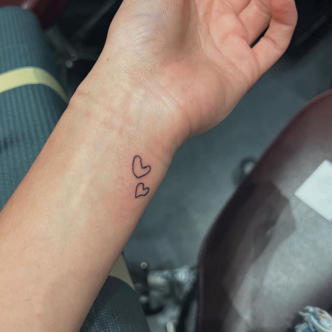 D with heart on forearm by Ravi Chauhan at Ink Need Tattoo Studio Bhagalpur  | Heart tattoos with names, Tattoos, Tattoo studio