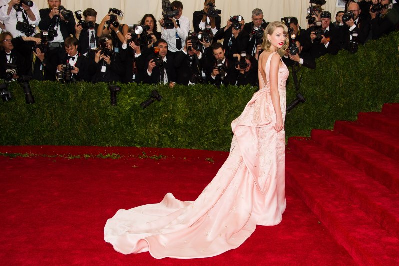 Taylor Swift Shines Like a 'Mirrorball' on the Red Carpet! Uncover Her Best Looks Throughout the Ye